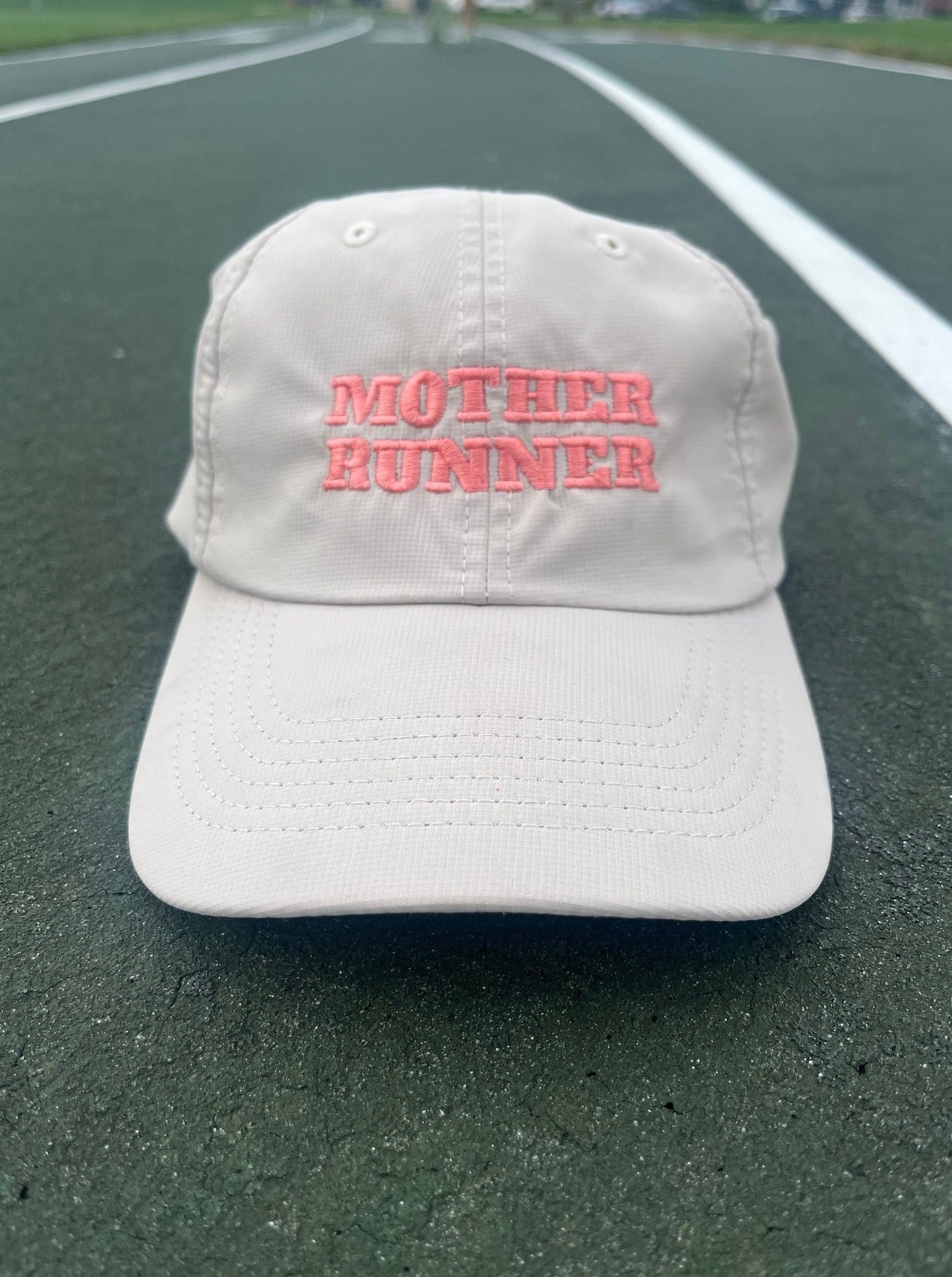 Mother Runner Hat on track